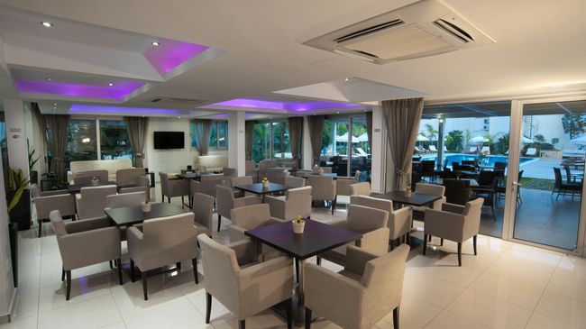 Frixos Suites Hotel Apts 沃罗里尼 餐厅 照片