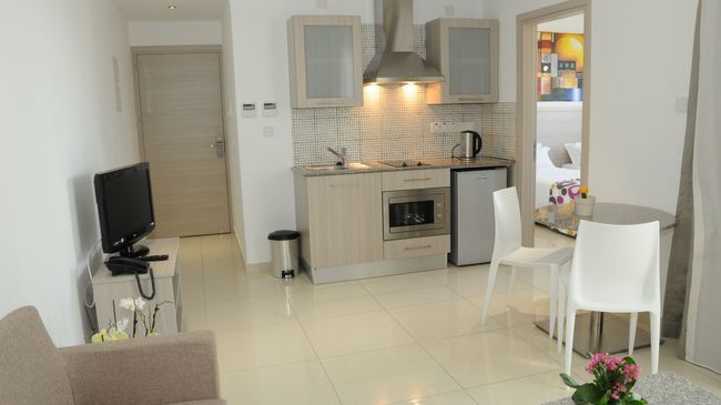Frixos Suites Hotel Apts 沃罗里尼 商标 照片